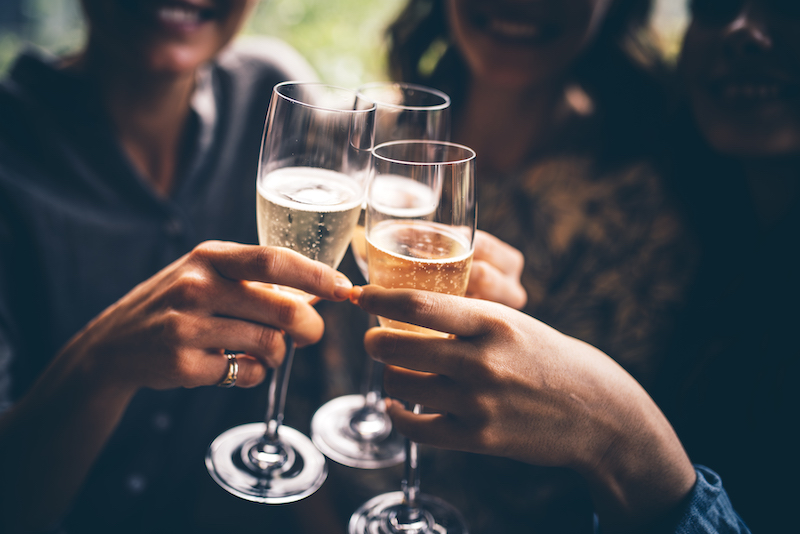 friends cheers over champagne